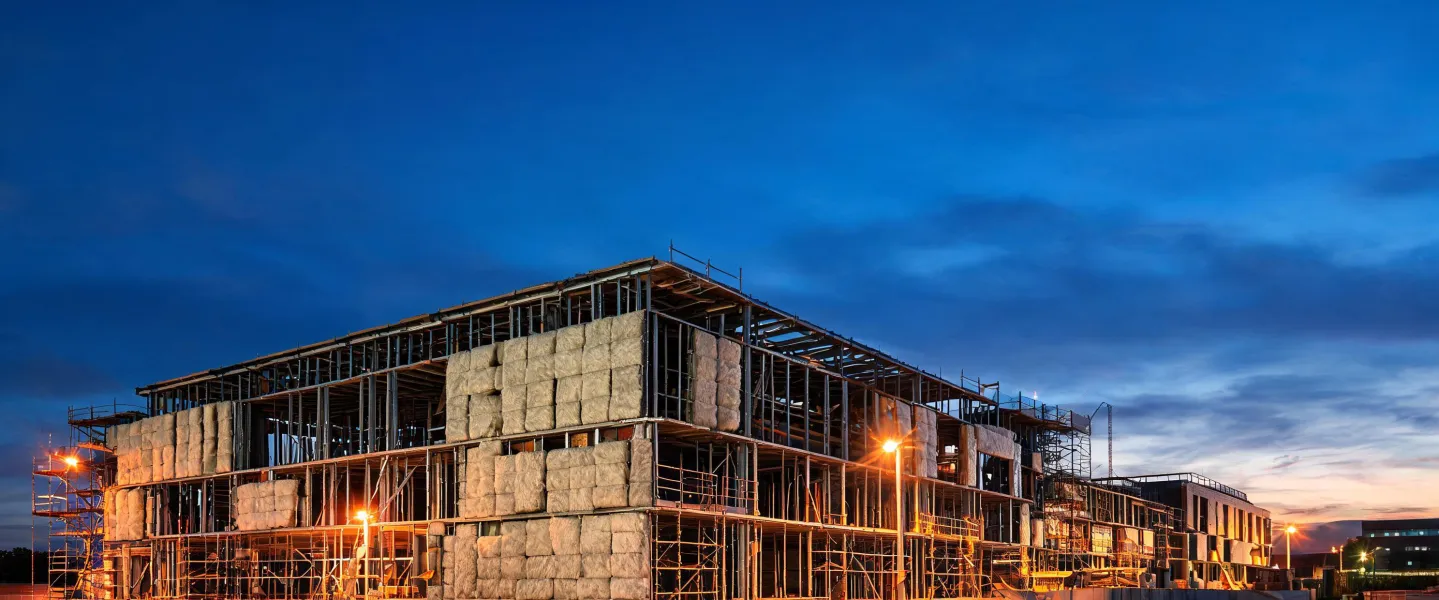 Wide view of insulated commercial facade under construction